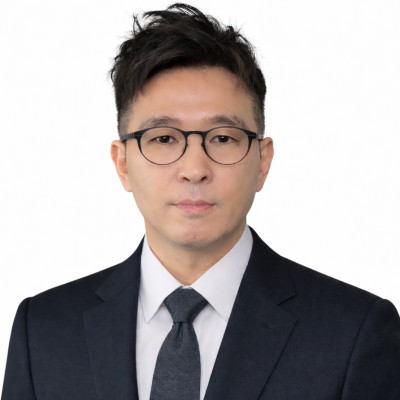 MyoungJin Kim wearing a suit