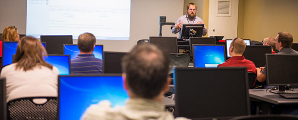 Professor in a classroom with students